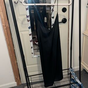 Star above silk small black dress